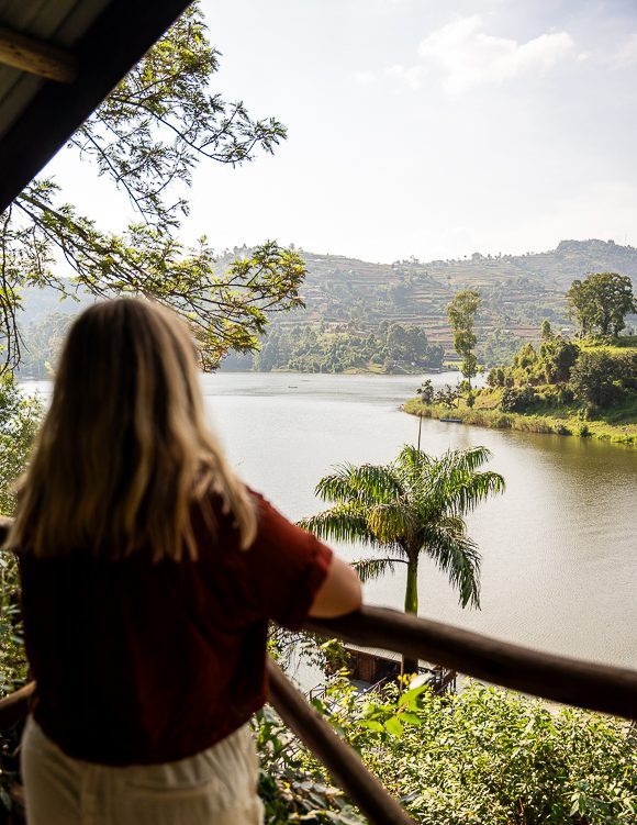 A woman enjoying the view of Lake Bunyonyi