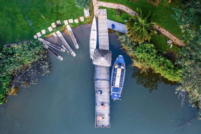 boats in water near Lake Bunyonyi Overland Resort