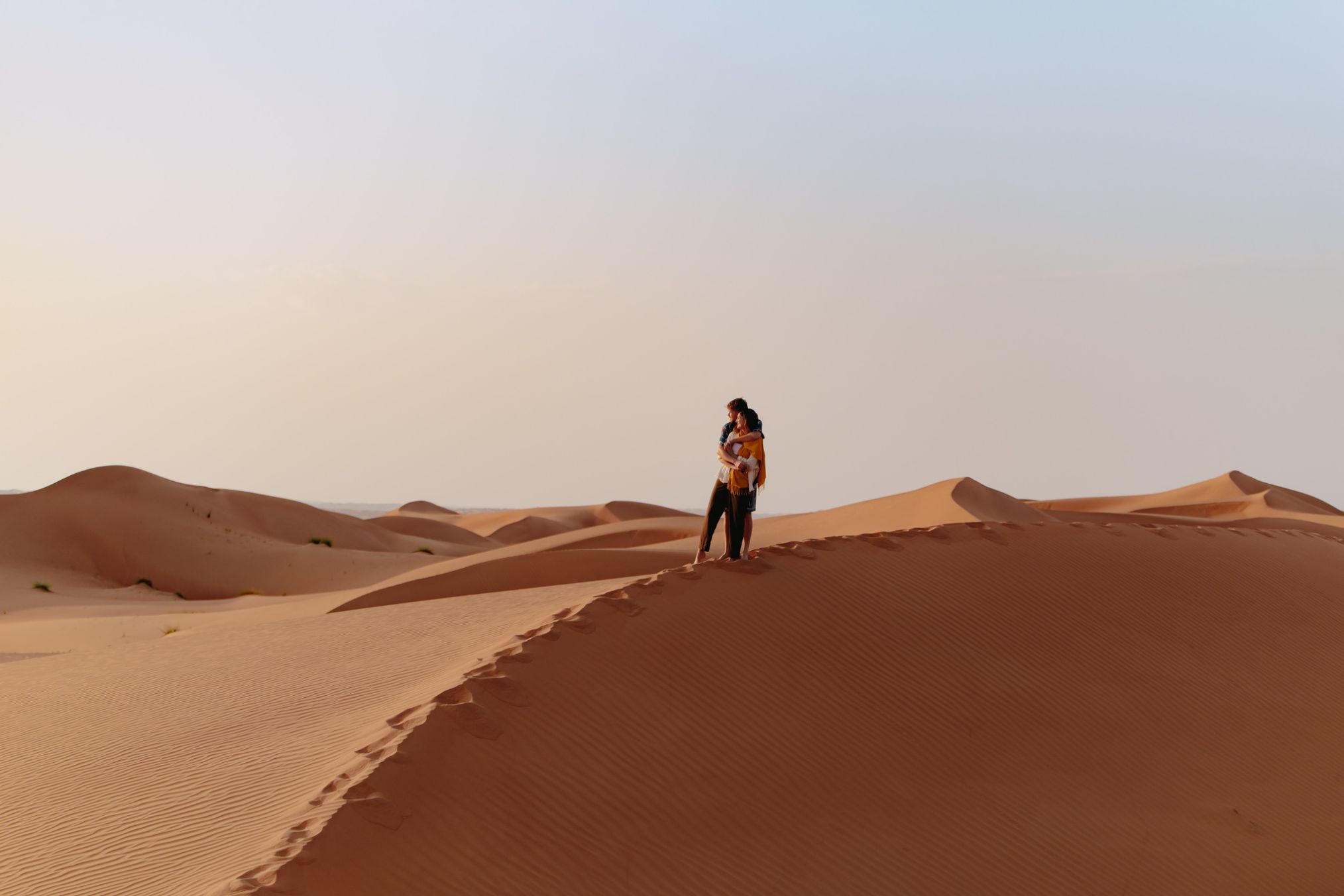 Couple above the dunes of Oman