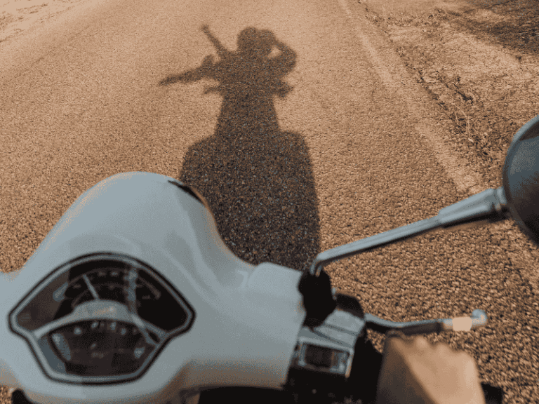 ciao bella auf einer Vespa